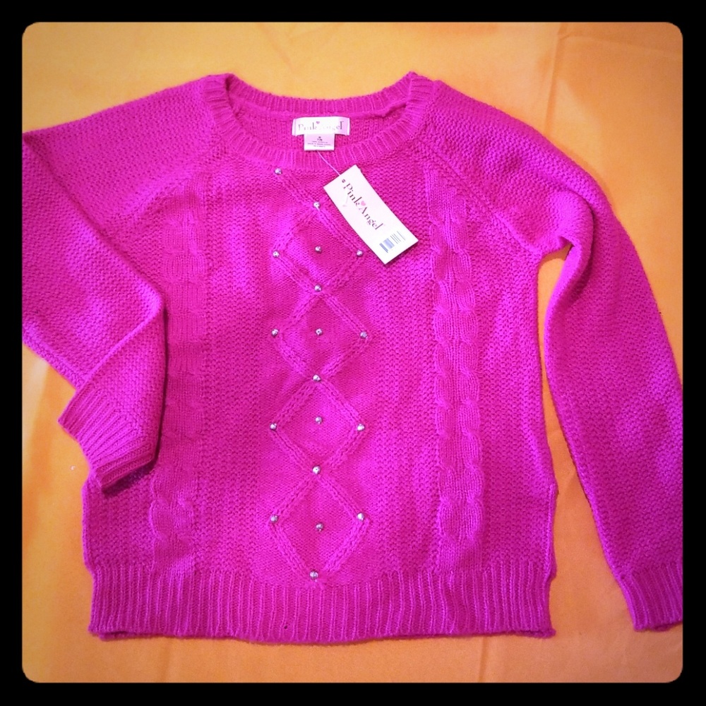 Pink acrylic sweaters with metal bead decorations
